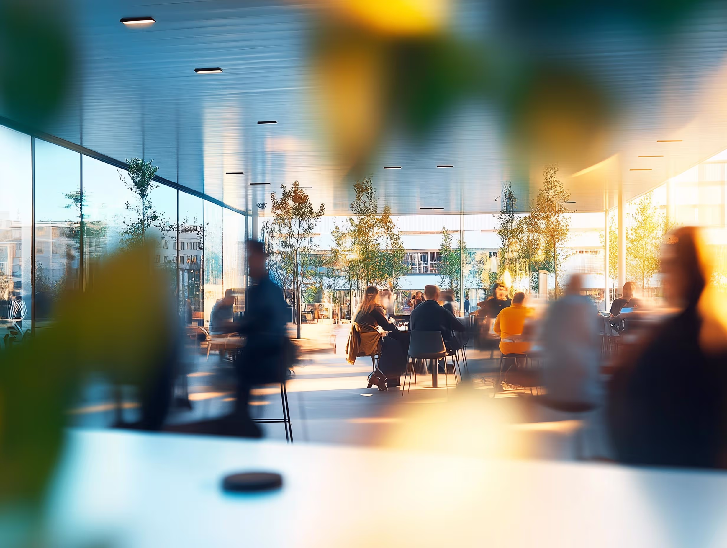 A blurry photo of people sitting at a table